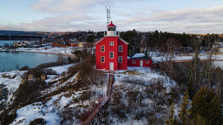 Marquette Harbor Lighthouse along Lake Superior in Marquette Michigan in the winter #6 Photograph by Eldon McGraw
