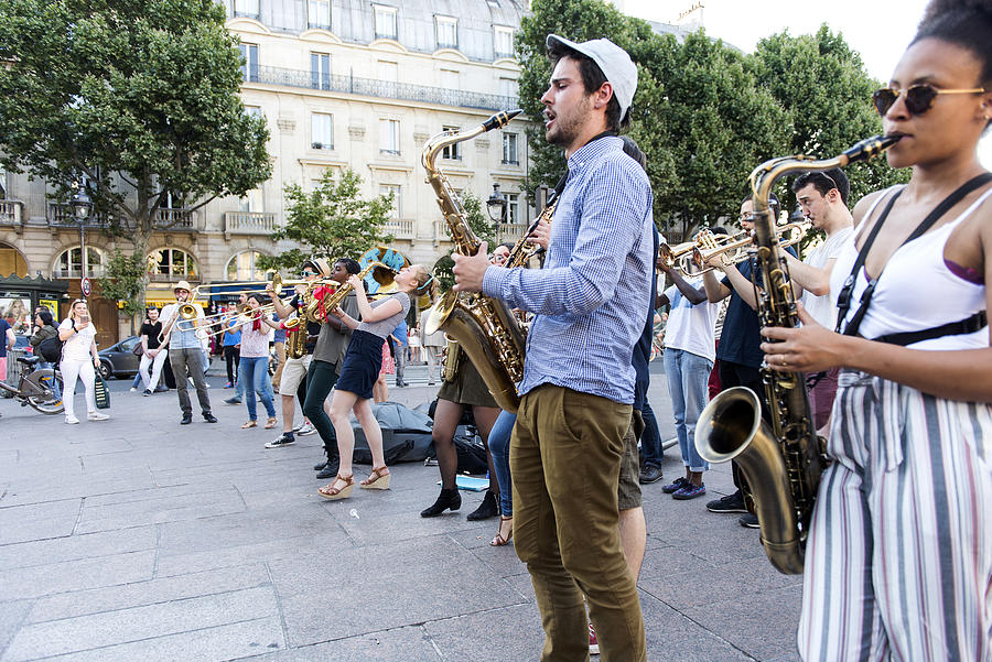 The bare brass band busking at Paris, France. #6 Photograph by Omersukrugoksu