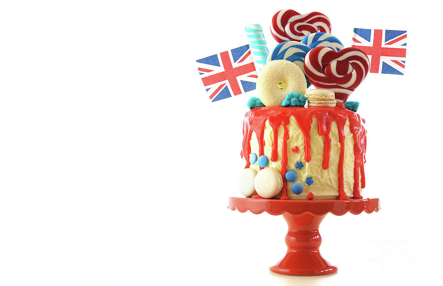 UK candyland drip cake with red white and blue decorations, lollipops and flags. #6 Photograph by Milleflore Images