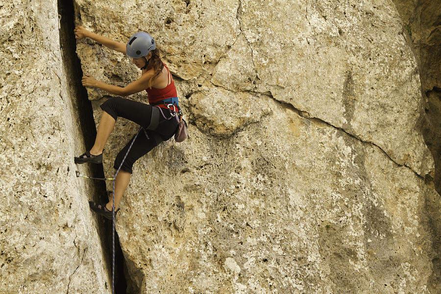 Woman rockclimbing #6 Photograph by Scotto72