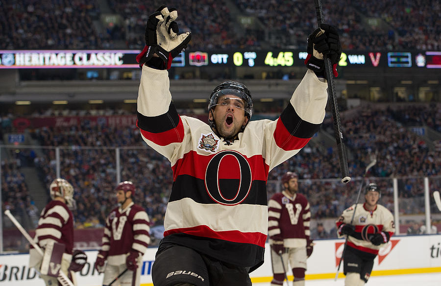 2014 Tim Hortons NHL Heritage Classic - Ottawa Senators v Vancouver Canucks #7 Photograph by Rich Lam