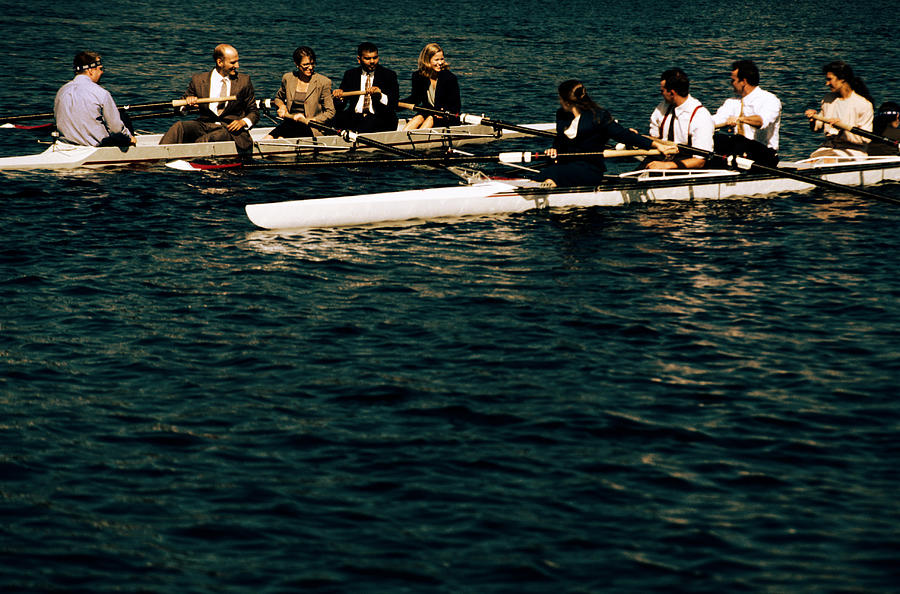 Businesspeople Rowing #7 Photograph by Ryan McVay