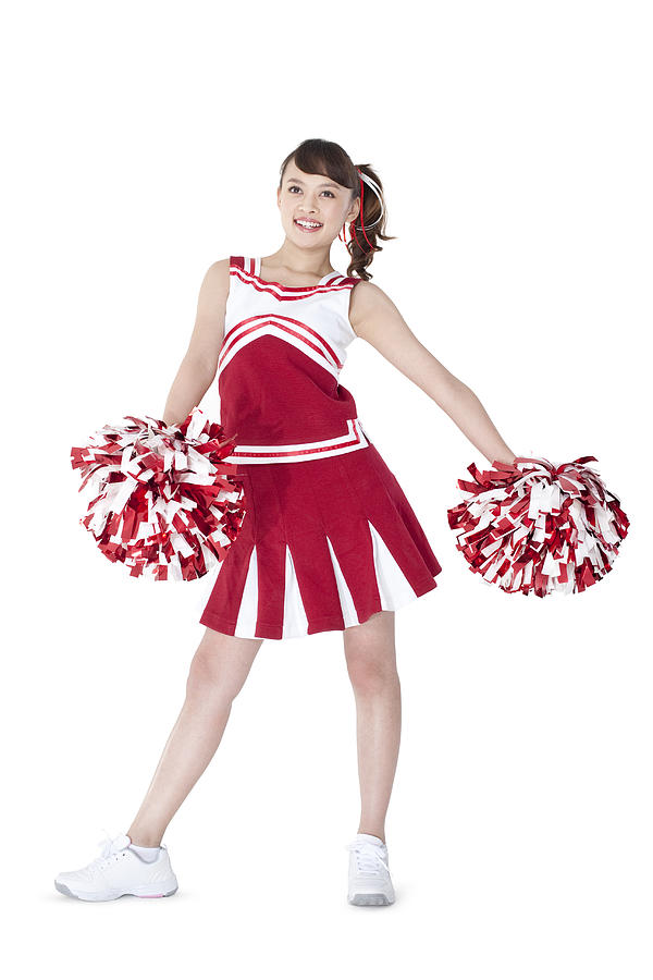 Cheerleader in action with her pom-poms #7 Photograph by Lane Oatey/Blue Jean Images