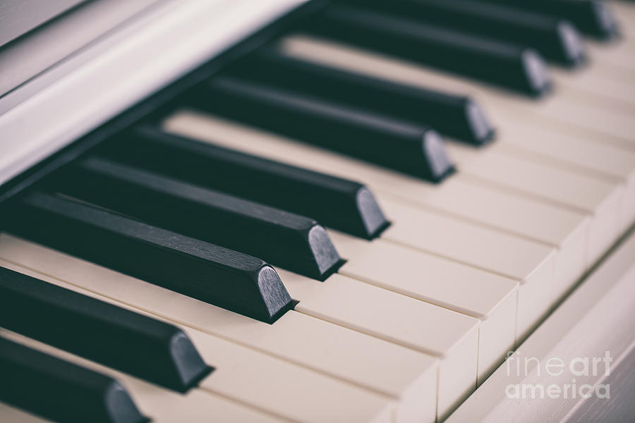 Classic white piano keyboard Photograph by Michal Bednarek - Fine Art