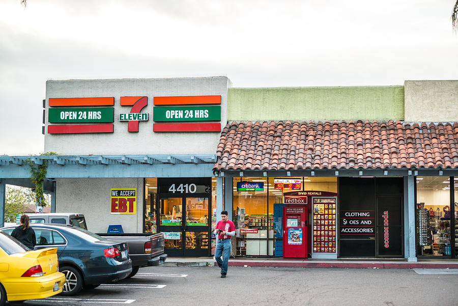 7 eleven in front of Las Americas shopping mall, San Diego, USA Photograph by Anouchka