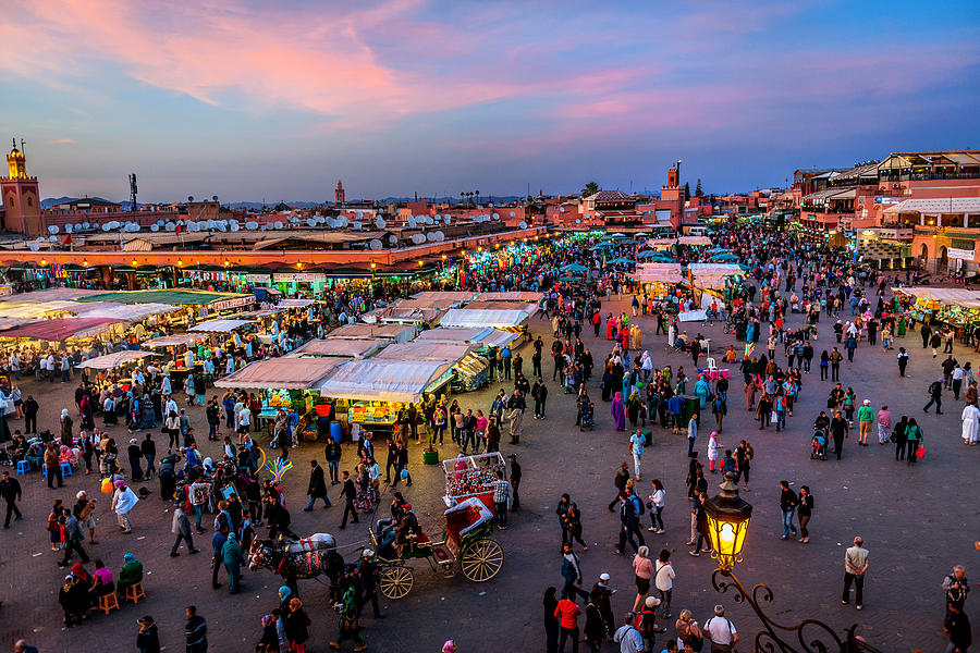 Evening Djemaa El Fna Square with Koutoubia Mosque, Marrakech, Morocco #7 Photograph by Pavliha