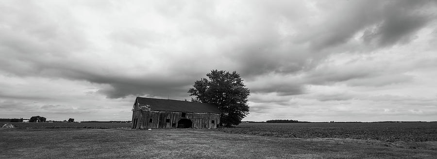 Storm clouds over farm in Michigan Photograph by Eldon McGraw