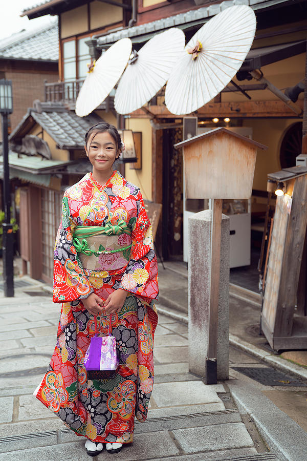 Japanese tourist girl in red Kimono traditional dress walking in #7 Photograph by Anek Suwannaphoom
