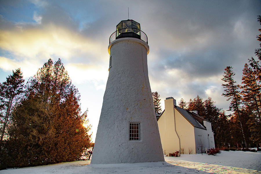Old Presque Isle Lighthouse in Michigan along Lake Huron in the winter #7 Photograph by Eldon McGraw