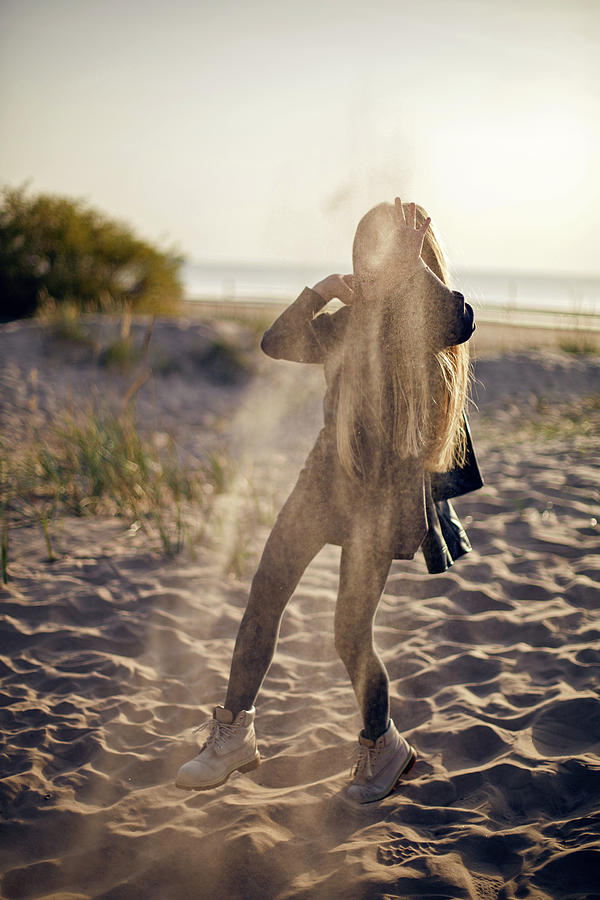 Portrait Of A Girl With Long Hair Sitting On A Sandy Beach #7 ...