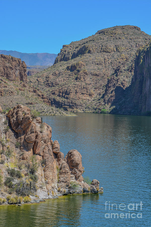 3 Rock formations line the shore of Canyon Lake in Tortilla Flat Tonto National Forest Arizona 3 by Norm Lane