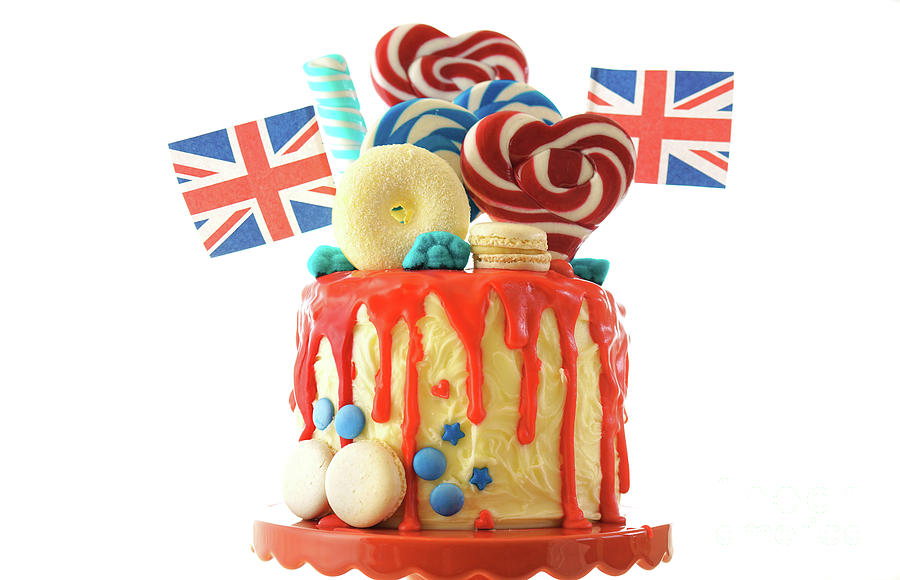 UK candyland drip cake with red white and blue decorations, lollipops and flags. #7 Photograph by Milleflore Images