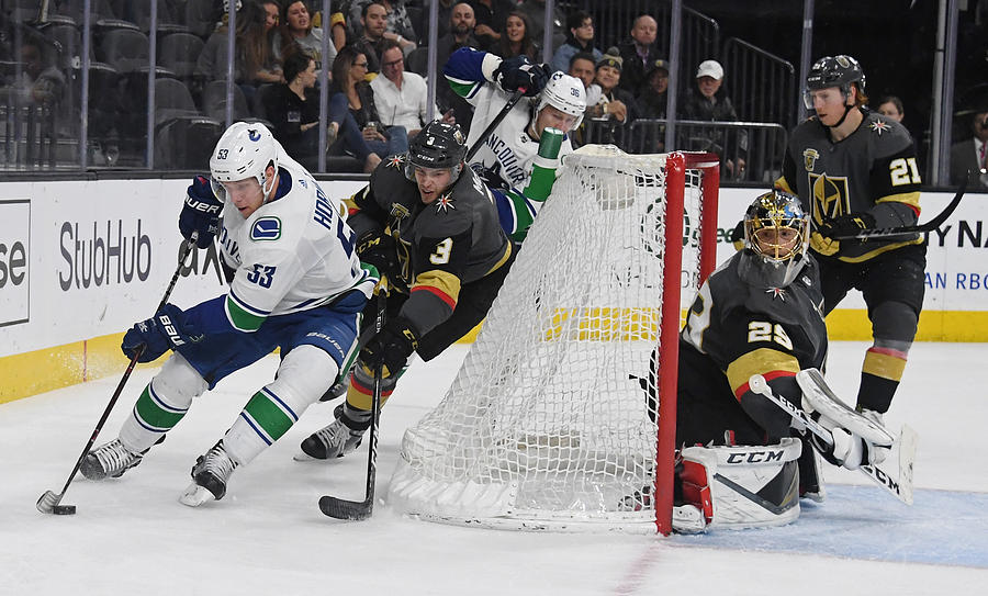 Vancouver Canucks v Vegas Golden Knights #7 Photograph by Ethan Miller