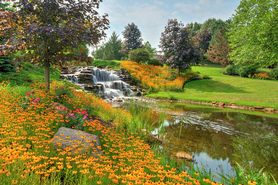 Waterfall with spring flowersHamilton County, Indiana Photograph by