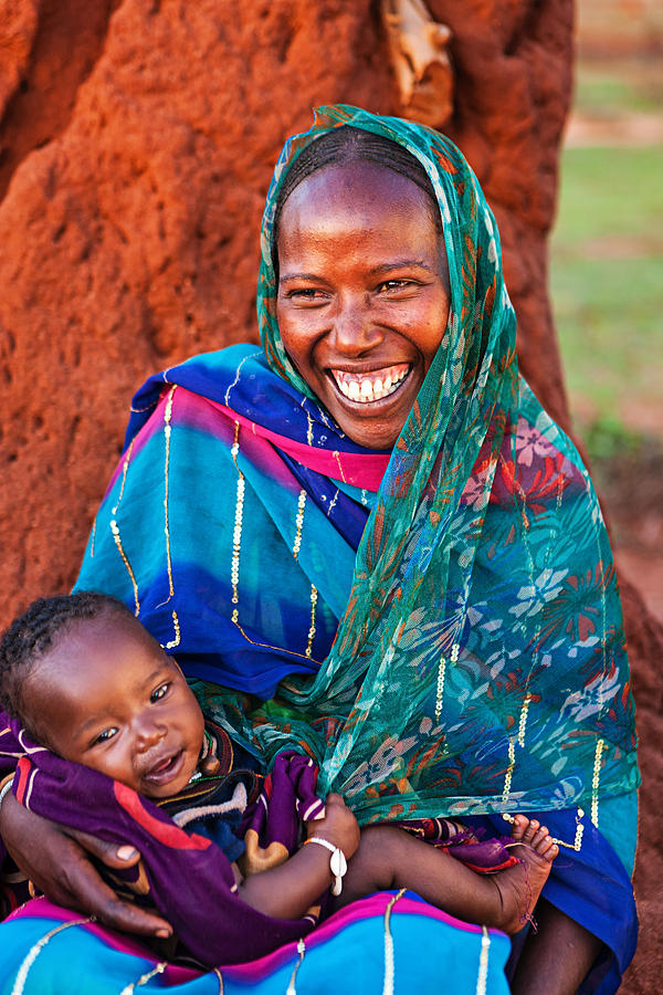 Woman from Borana tribe holding her baby, Ethiopia, Africa #7 Photograph by Hadynyah