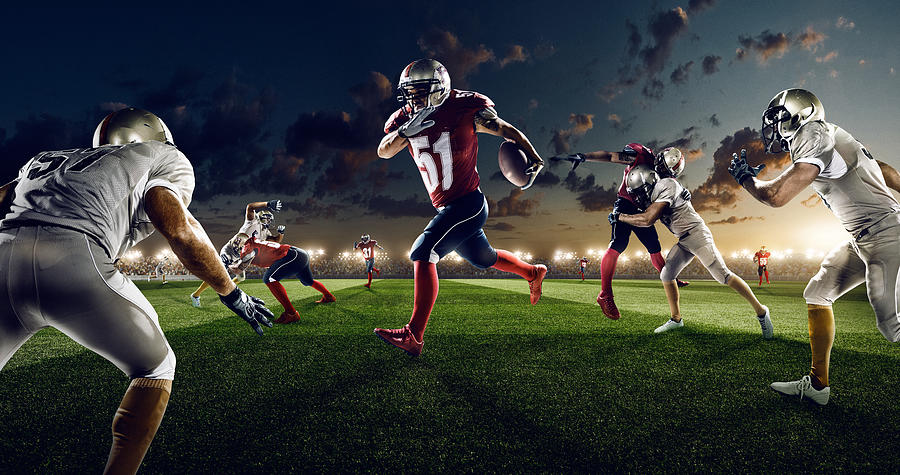 American football in action #8 Photograph by Dmytro Aksonov