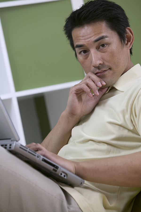 Man with laptop #8 Photograph by Comstock Images