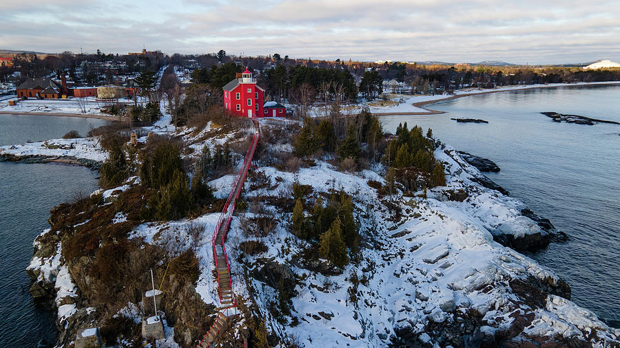 Marquette Harbor Lighthouse along Lake Superior in Marquette Michigan in the winter #8 Photograph by Eldon McGraw