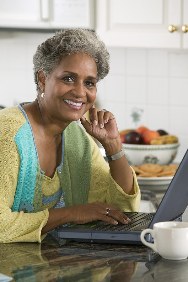Woman with laptop #8 Photograph by Comstock Images