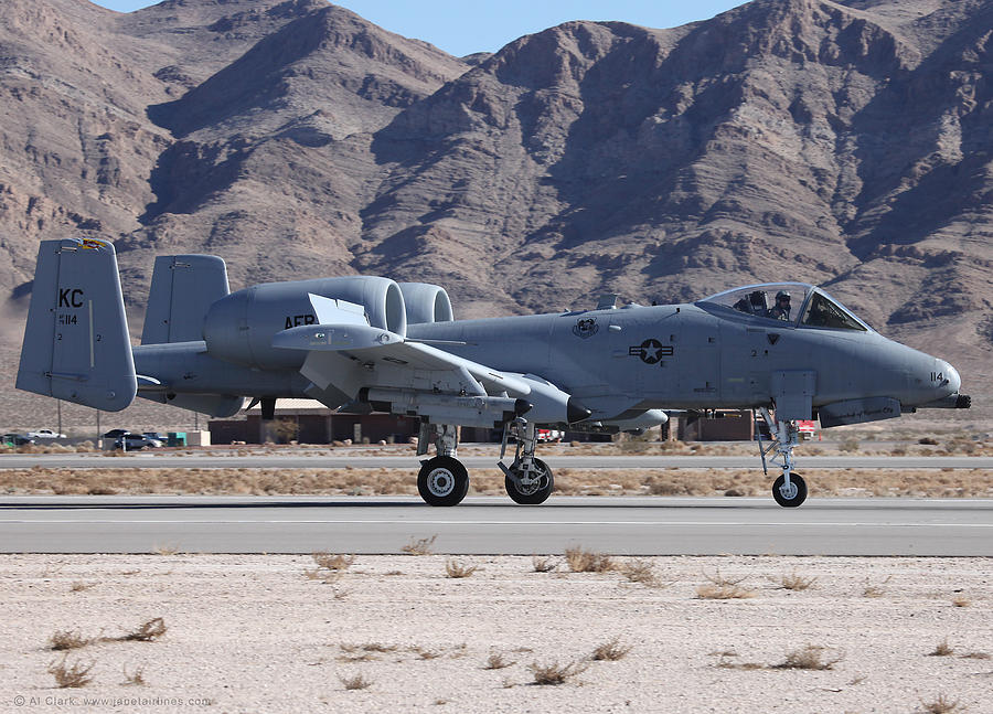 KC AFRC A-10 Warthog rolling out on 21 L at Nellis Photograph by Custom Aviation Art