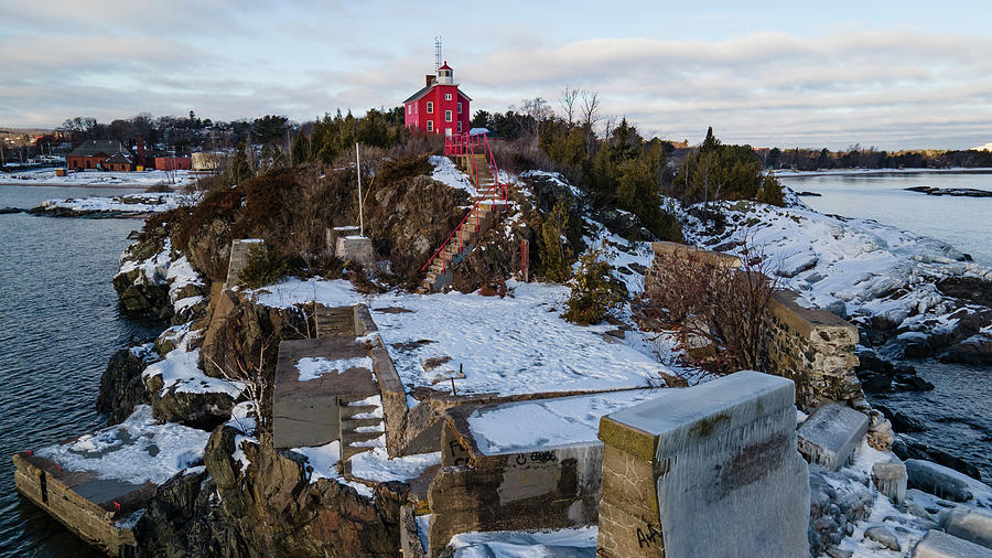Marquette Harbor Lighthouse along Lake Superior in Marquette Michigan in the winter #9 Photograph by Eldon McGraw
