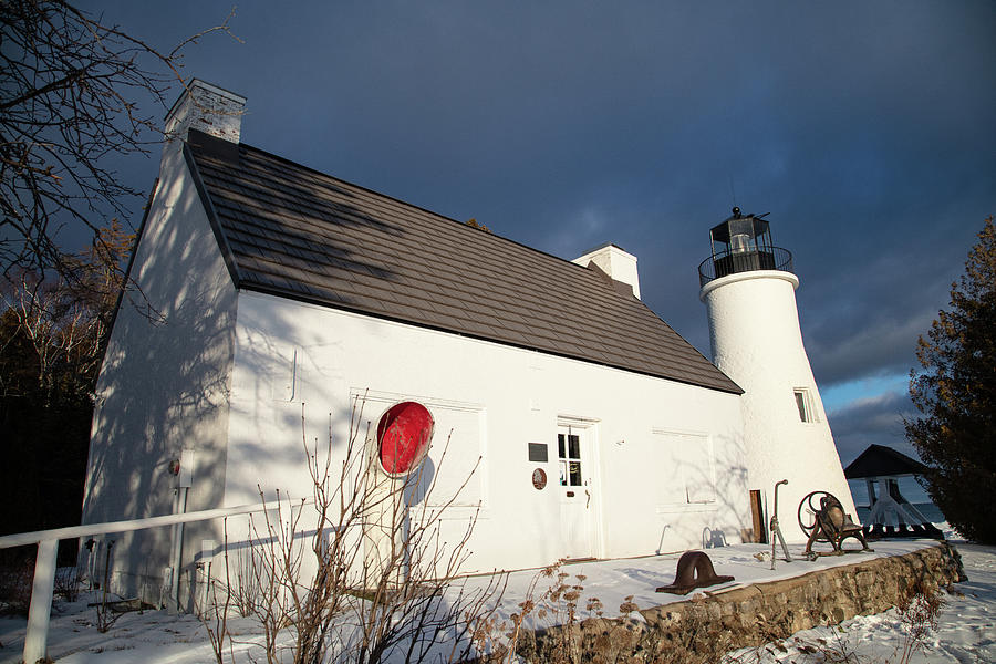 Old Presque Isle Lighthouse in Michigan along Lake Huron in the winter #9 Photograph by Eldon McGraw