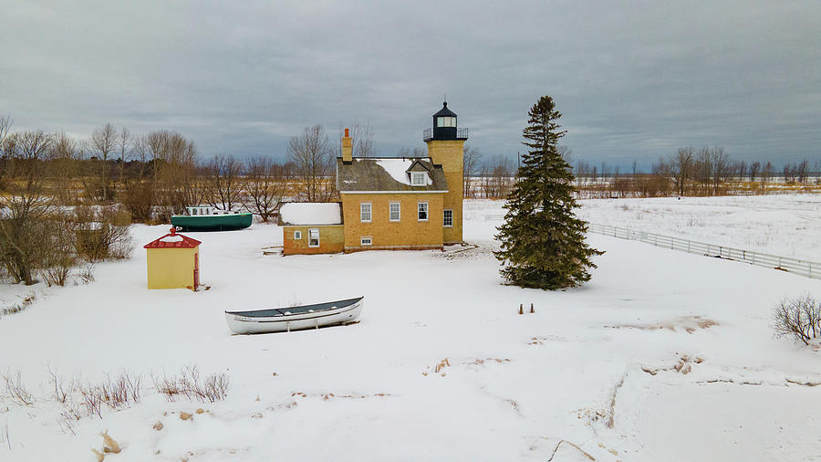 Ontonagon Michigan Lighthouse along Lake Superior in winter #9 Photograph by Eldon McGraw
