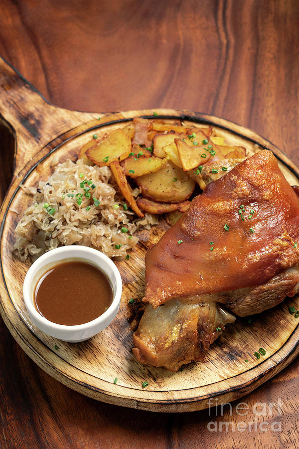 SCHWEINSHAXE traditional german pork knuckle with sauerkraut and ...