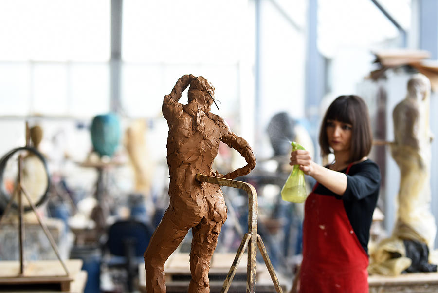 Young Female Sculptor is working in her studio #9 Photograph by Baranozdemir