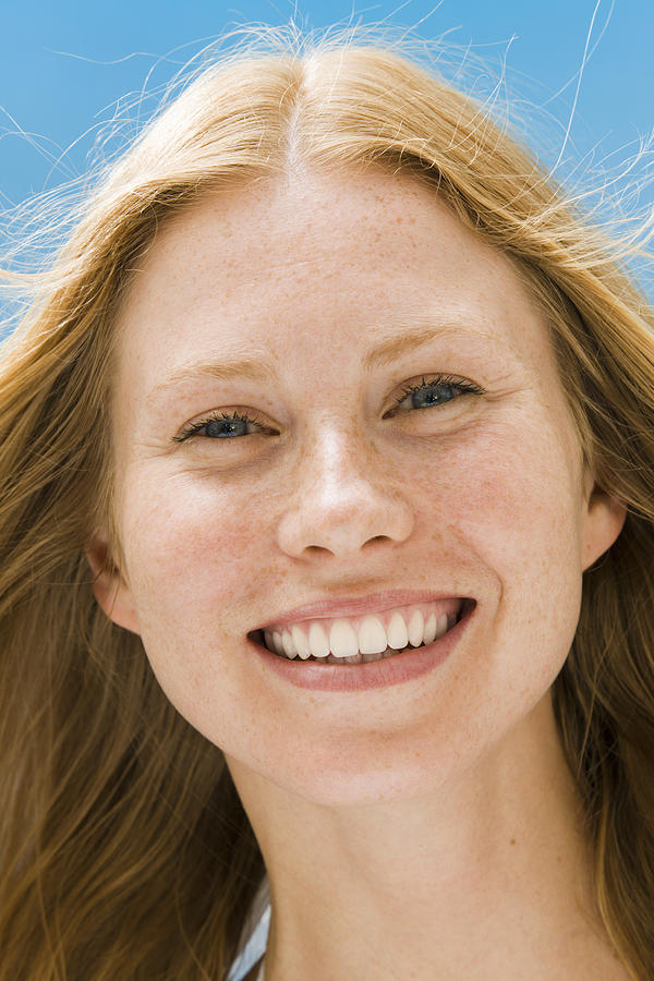 Young woman smiling, portrait #9 Photograph by Pando Hall