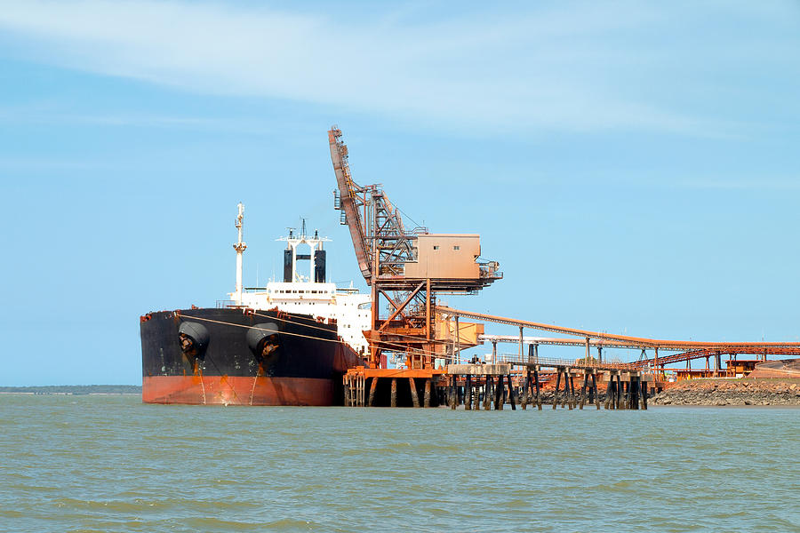 A 254 Meter Ore Carrier Ship Unloading Bauxite At Gladstone Harbour, Queensland, Australia. Photograph