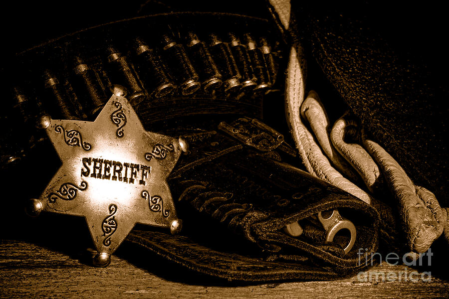A Badge and a Weapon - Sepia Photograph by American West Legend A Badge and a Weapon - Sepia Photograph by American West Legend