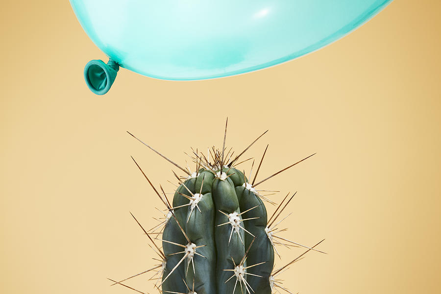 A balloon flying too close to cactus Photograph by Richard Drury