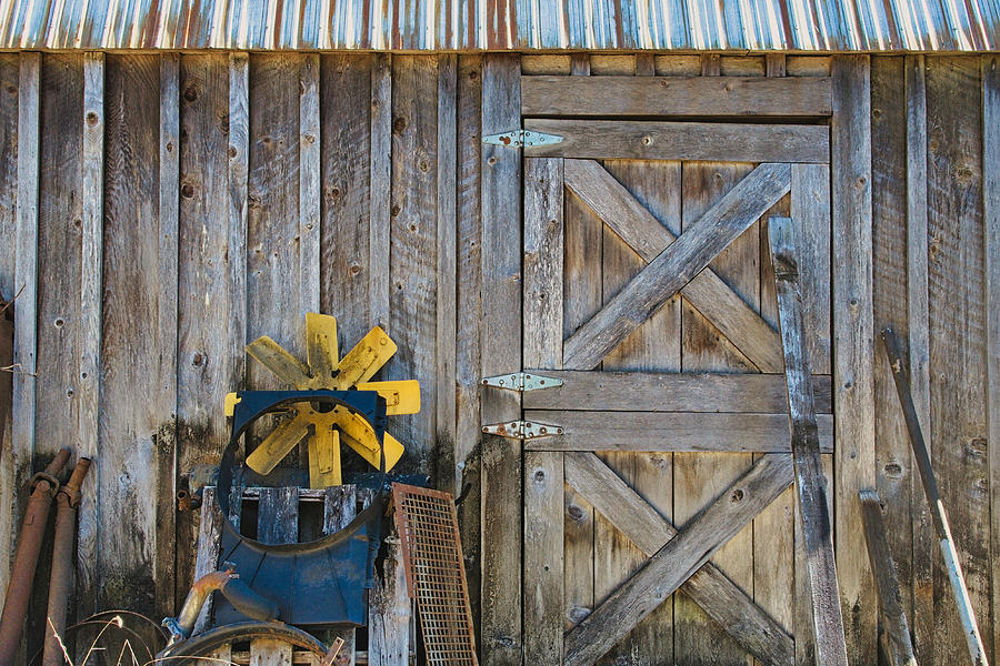 Car Photograph - A Barn Door and Fan by Chuck Burdick