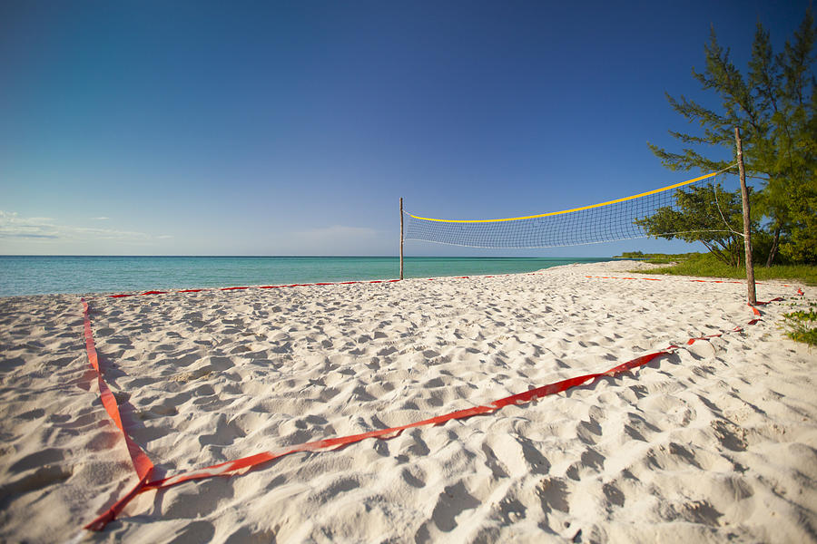 A beach volleyball court set up beside the ocean on Playa La Jaula beach, Cayo Coco, Cuba. Photograph by Christopher Kimmel