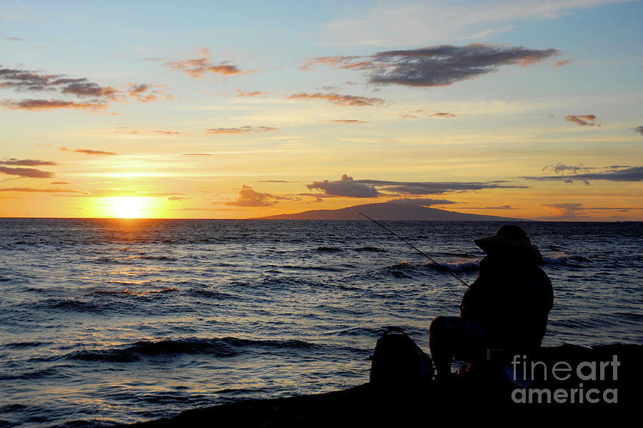 A beautiful sunset at Kihei Beach on the island of Maui, Hawaii.	 Photograph by Gunther Allen