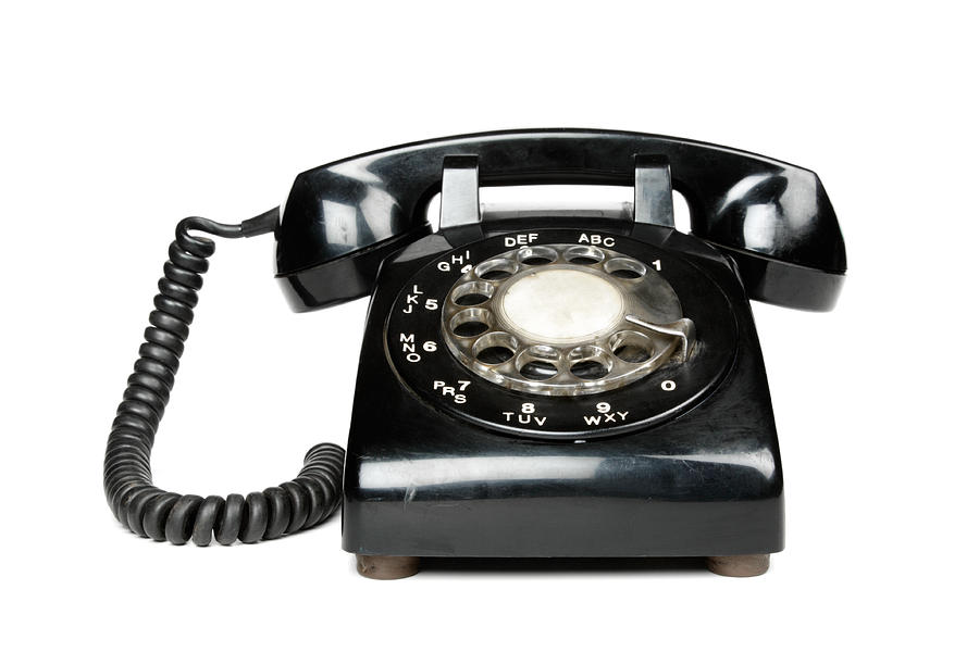 A black vintage rotary dial telephone Photograph by Spauln