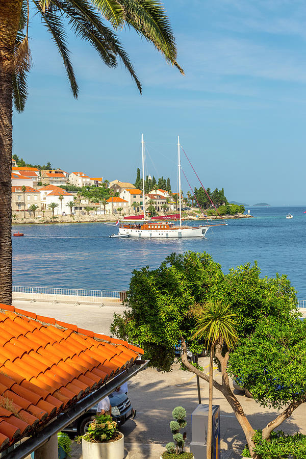 A Boat in Korcula Harbor Photograph by W Chris Fooshee
