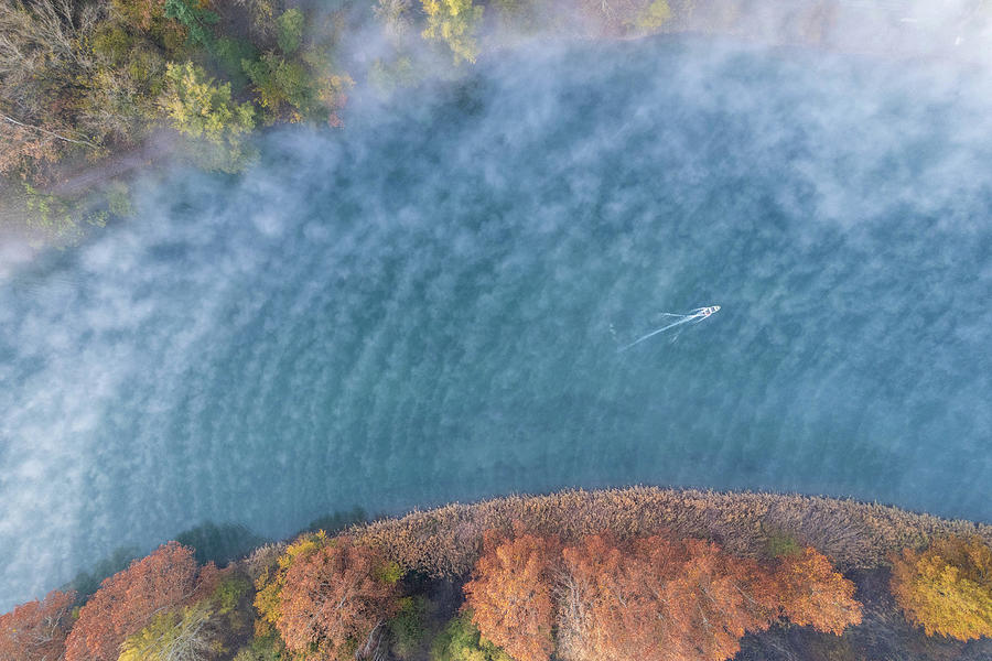 A boat in the river fron drone Photograph by Pietro Ebner