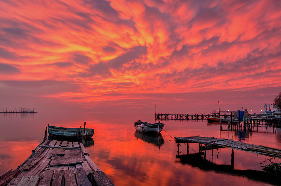 A burning sky over an old pier Photograph by Alexios Ntounas