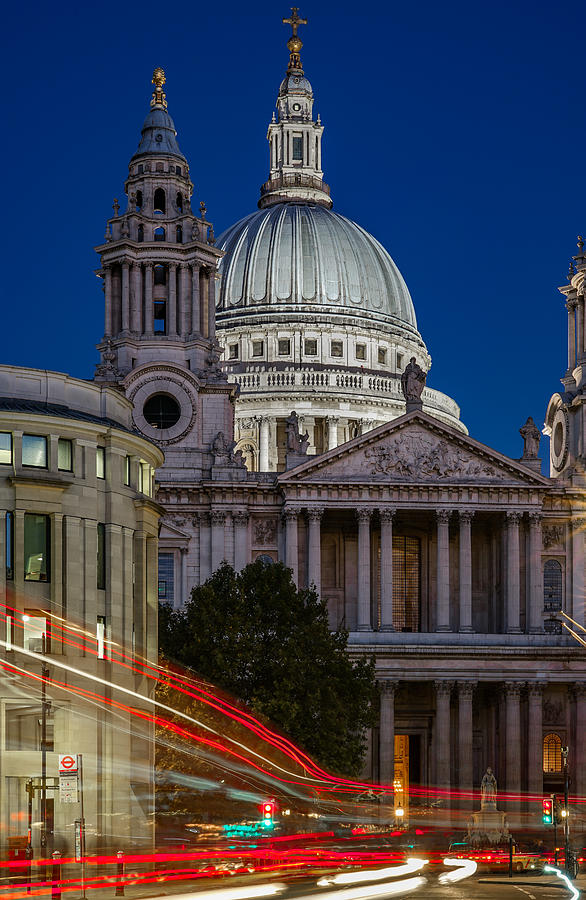 A bus passing by St. Paul's cathedral in London. Photograph by George ...