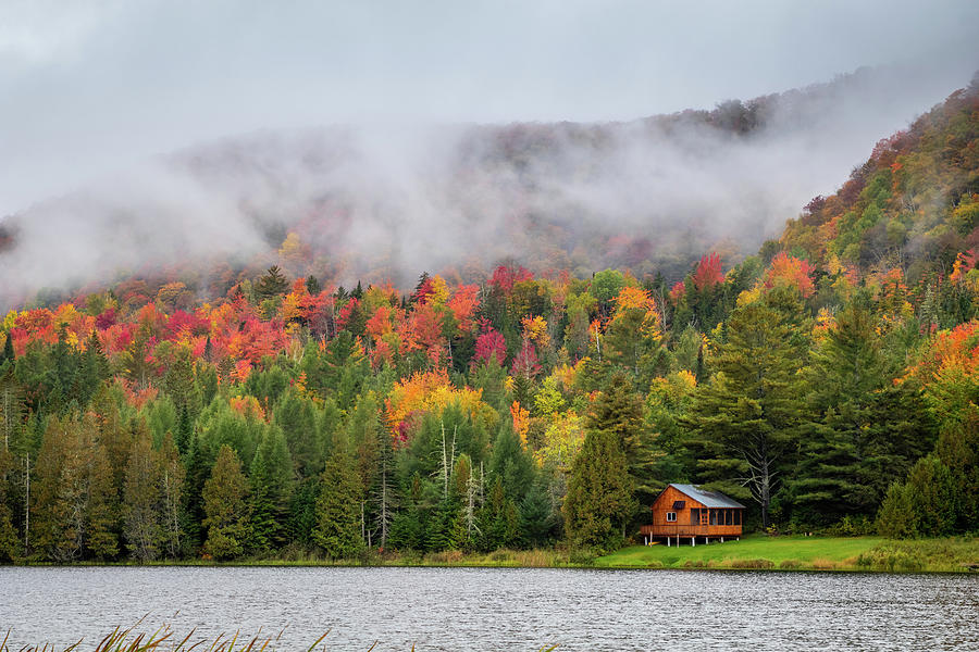 A cabin sits Among the Fall Colors in Vermont Photograph by Jeff Folger