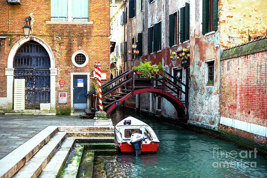 A Canal in Venice Italy Photograph by John Rizzuto
