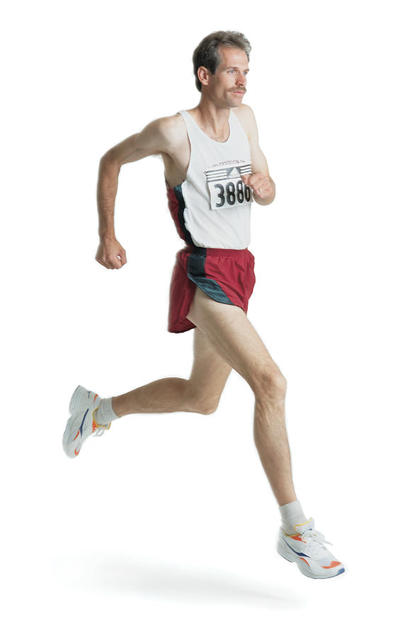 A Caucasian Man With A Mustache Is Wearing A Red Track Uniform And A Marathon Number As He Runs Photograph by Photodisc