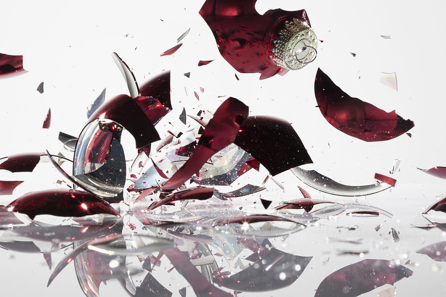 A Christmas bauble shattering Photograph by Dual Dual