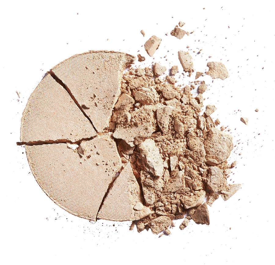 A close up beauty image of a smashed or broken powder make up compact Photograph by William Turner