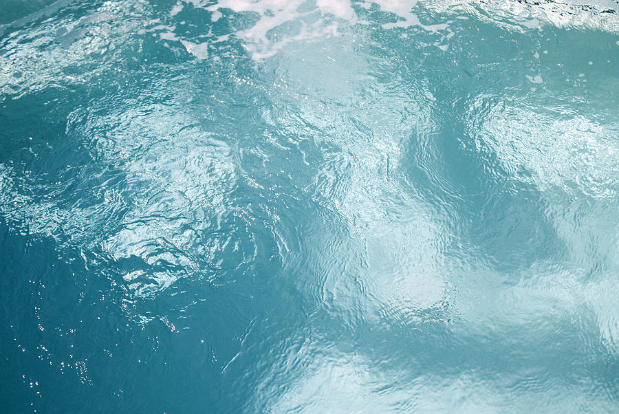 A close up image of a hot tub with blue water Photograph by CDH_Design