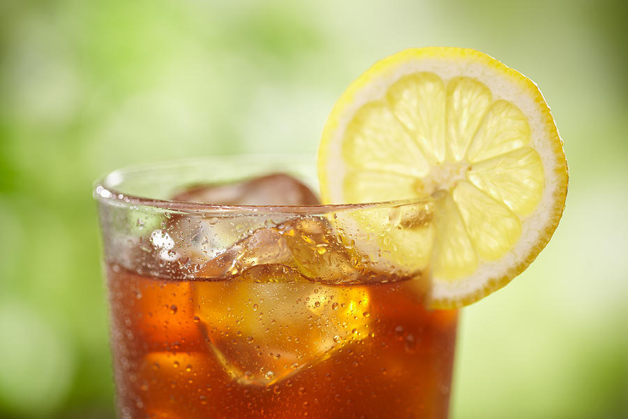 A close-up of a glass of iced tea with lemon Photograph by Pjohnson1