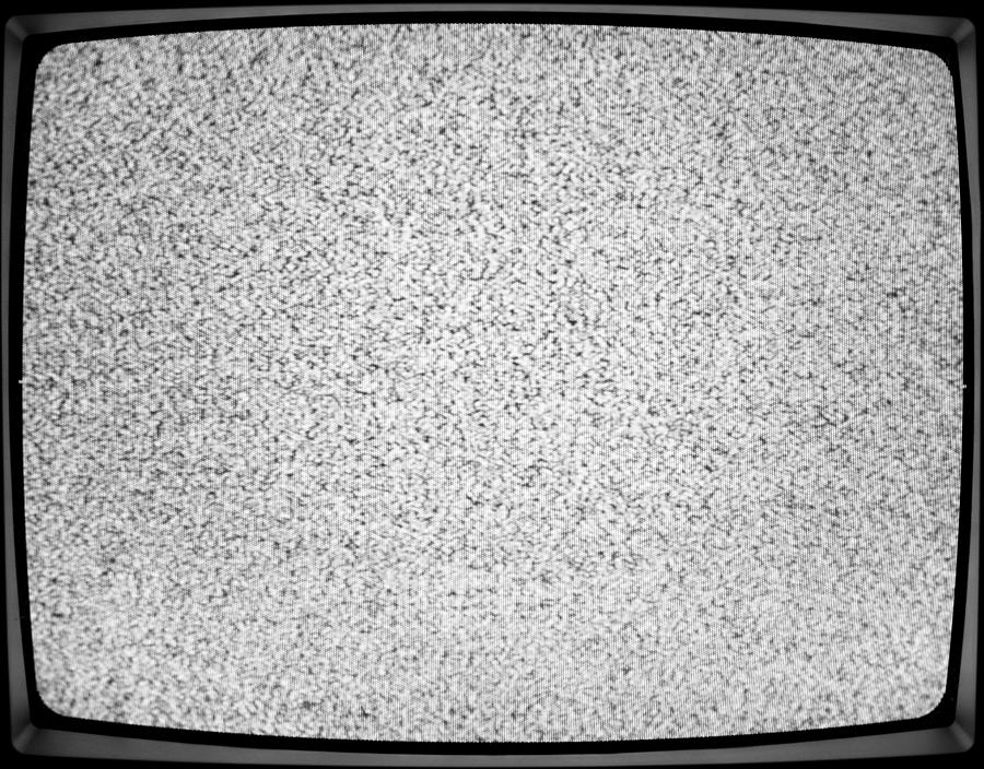 A close-up of a white noise on a TV screen Photograph by Bunhill