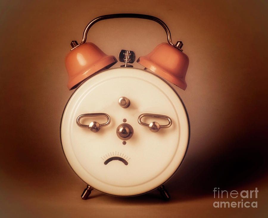 Abstract Photograph - A closeup shot of a face-looking vintage alarm by Bernard Jaubert